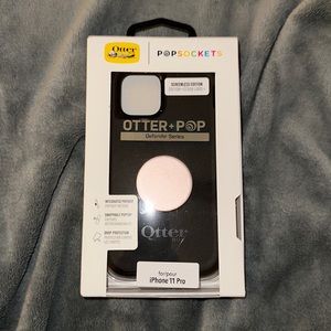 Otterbox pop sockets, defender series,  fits iPhone 11 Pro & black with pink pop